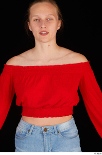 Stacy Cruz casual dressed red off shoulder top upper body…